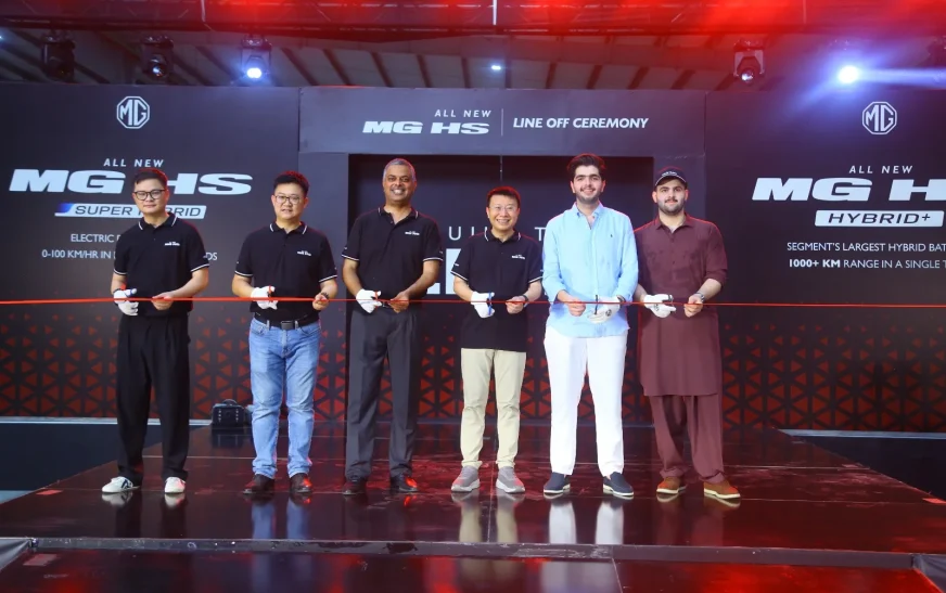 MG Pakistan officials holding a ribbon-cutting ceremony for the CKD line-off of the All New MG HS Hybrid+ and Super Hybrid vehicles.