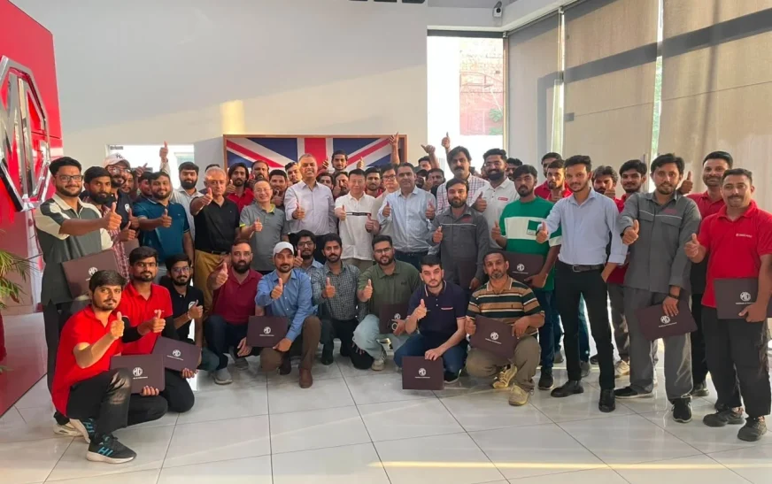 MG Motor Pakistan dealership technicians receiving hands-on hybrid vehicle battery training as part of nationwide after-sales readiness for MG HS Hybrid+ and MG HS Super Hybrid.