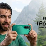 Man using TECNO CAMON 50 in the rain, highlighting its IP68/IP69K water and dust resistance for monsoon photography and outdoor content creation.